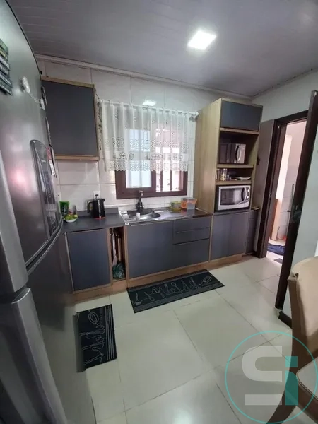 Casa 2 dormitórios de terreno inteiro em CAPÃO DA CANOA: 18ª foto da galeria de imagens do imóvel