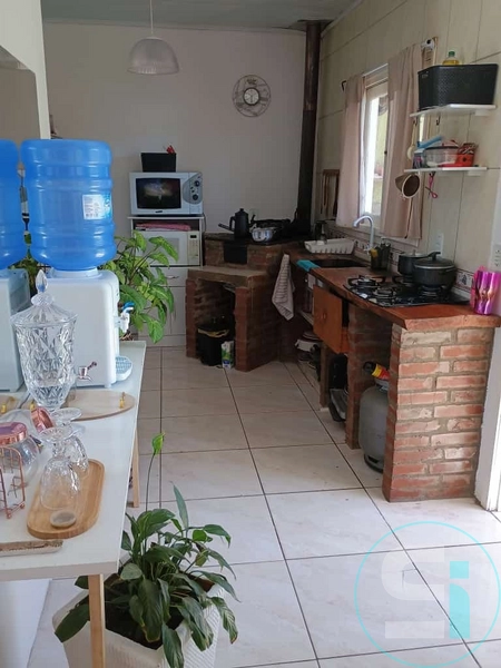 Casa à venda com piscina no Capão novo: 2ª foto da galeria de imagens do imóvel