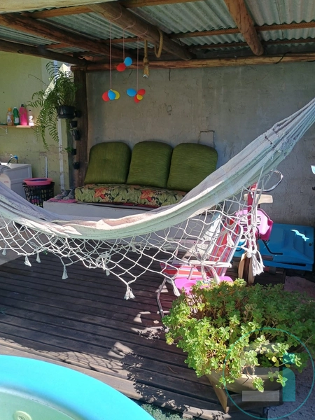Casa à venda com piscina no Capão novo: 1ª foto da galeria de imagens do imóvel