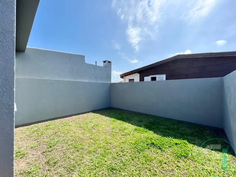 CASA GEMINADA PROXIMO AO CENTRO DE CAPÃO DA CANOA-RS: 3ª foto da galeria de imagens do imóvel