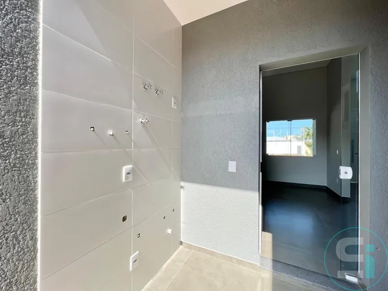 CASA GEMINADA PROXIMO AO CENTRO DE CAPÃO DA CANOA-RS: 2ª foto da galeria de imagens do imóvel