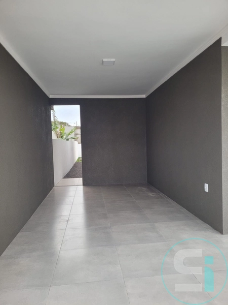 casa geminada em capao novo: 2ª foto da galeria de imagens do imóvel