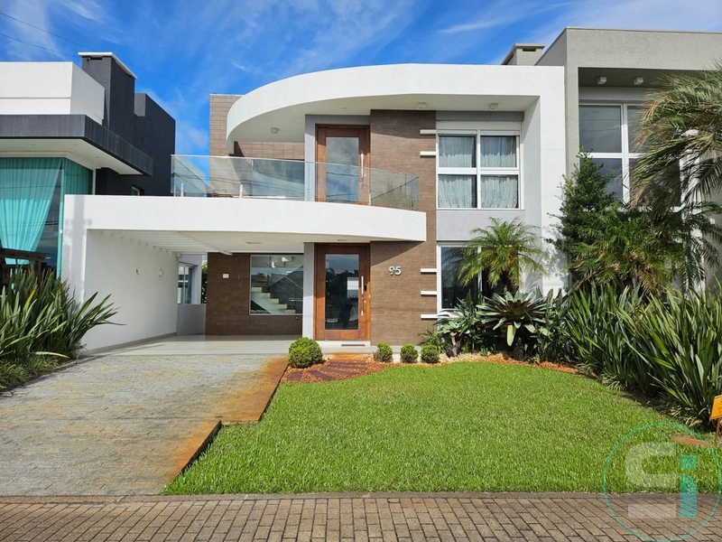 Linda casa de frente para o lago em Xangri-lá: 1ª foto da galeria de imagens do imóvel