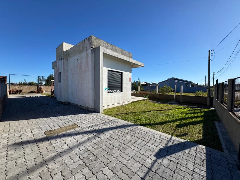 Casa em Atlântida Sul: 2ª foto da galeria de imagens do imóvel