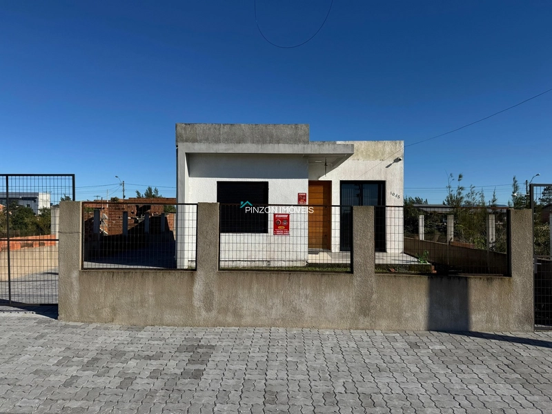 Casa em Atlântida Sul: 3ª foto da galeria de imagens do imóvel