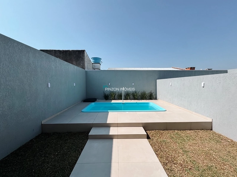 DUPLEX COM PISCINA A 50M DO CENTRINHO DE ATLÂNTIDA SUL: 2ª foto da galeria de imagens do imóvel