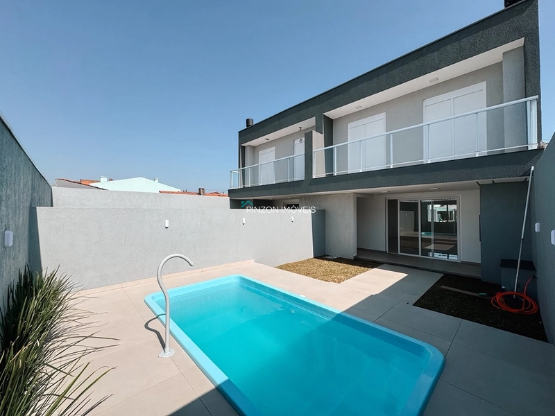 DUPLEX COM PISCINA A 50M DO CENTRINHO DE ATLÂNTIDA SUL: 1ª foto da galeria de imagens do imóvel