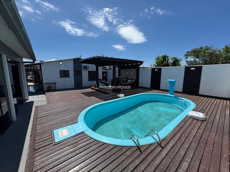 Casa com piscina em Atlântida Sul: 12ª foto da galeria de imagens do imóvel