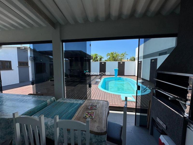 Casa com piscina em Atlântida Sul: 5ª foto da galeria de imagens do imóvel