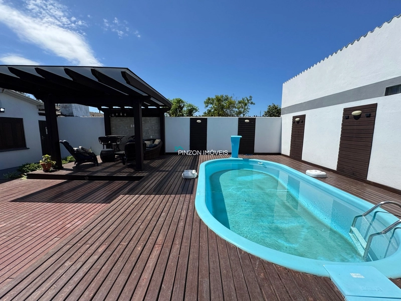 Casa com piscina em Atlântida Sul: 6ª foto da galeria de imagens do imóvel