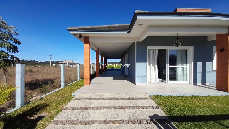 CASA QUE REÚNE CONFORTO E QUALIDADE DE VIDA EM ARROIO DO SAL: 4ª foto da galeria de imagens do imóvel