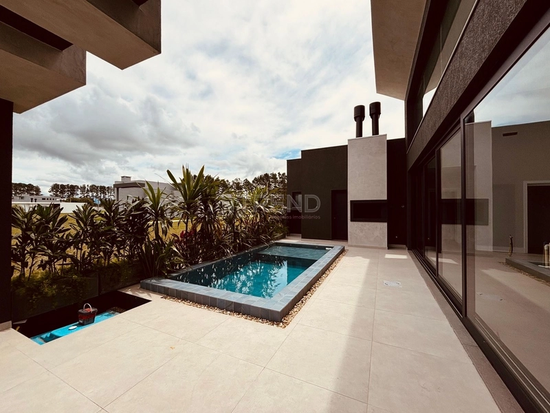 Excelente Casa com 3 suite ,piscina ampla em condominio Capão da Canoa: 4ª foto da galeria de imagens do imóvel