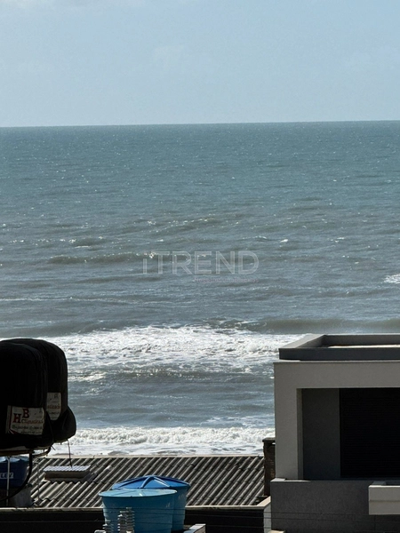 Um dormitório com vista para o mar - Zona Nova: 3ª foto da galeria de imagens do imóvel