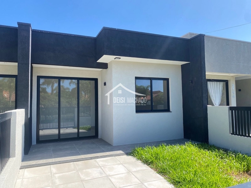 Linda casa geminada em Capão Novo: 2ª foto da galeria de imagens do imóvel