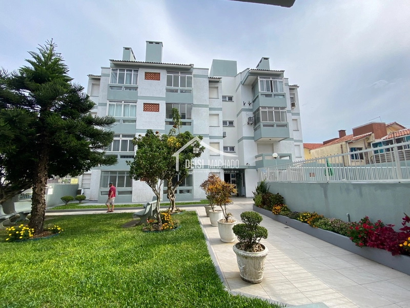 Apartamento térreo em prédio com piscina a venda na praia Capão Novo: 1ª foto da galeria de imagens do imóvel