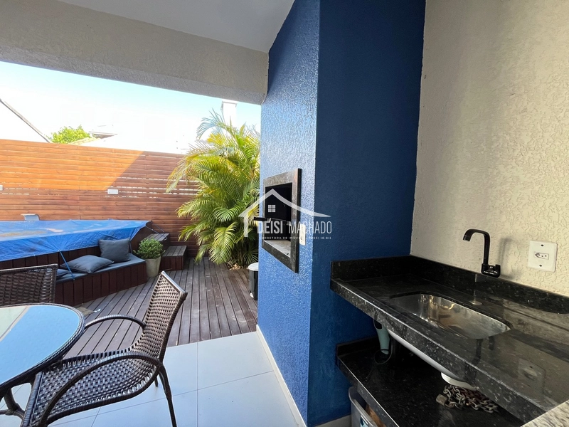 Linda casa geminada em Capão Novo: 1ª foto da galeria de imagens do imóvel