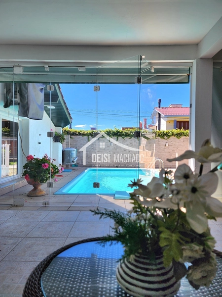 CASA 3 DORMITÓRIOS LOCALIZADA A POUCOS METROS DO MAR!: 22ª foto da galeria de imagens do imóvel