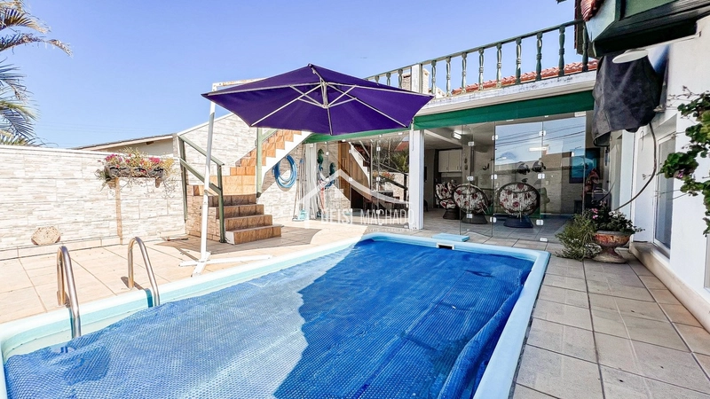CASA 3 DORMITÓRIOS LOCALIZADA A POUCOS METROS DO MAR!: 47ª foto da galeria de imagens do imóvel