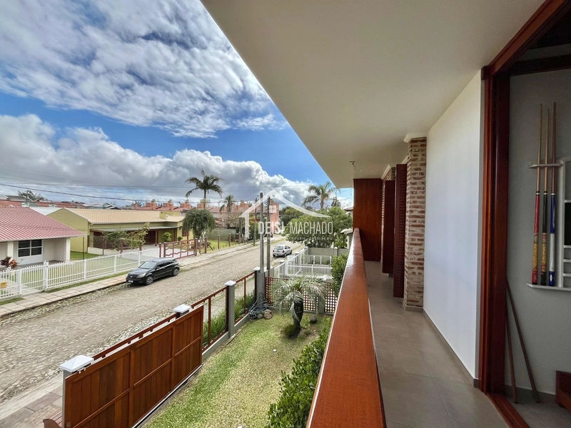 Sobrado amplo e completo em Capão Novo: 7ª foto da galeria de imagens do imóvel