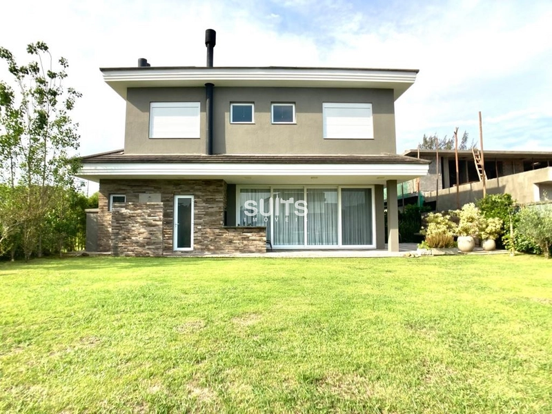 Magnífico sobrado à venda no condomínio Villaggio em Atlântida: 40ª foto da galeria de imagens do imóvel