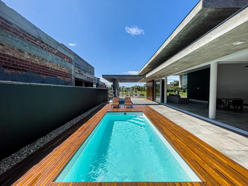 Belíssima casa no condomínio Villaggio Atlântida: 8ª foto da galeria de imagens do imóvel