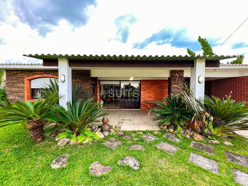 Excelente casa á venda em Atlântida : 2ª foto da galeria de imagens do imóvel