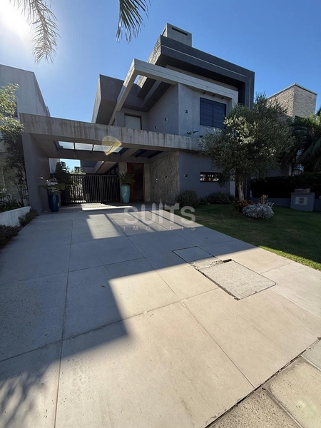 Excelente sobrando à venda no condomínio Condado em Capão da Canoa: 2ª foto da galeria de imagens do imóvel