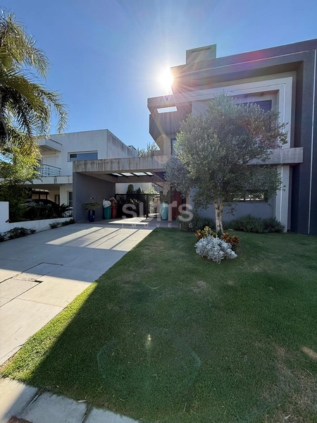 Excelente sobrando à venda no condomínio Condado em Capão da Canoa: 1ª foto da galeria de imagens do imóvel