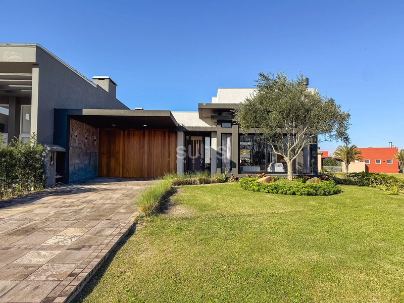 Excelente casa térrea à venda no condomínio Riviera em Xangri-lá: 3ª foto da galeria de imagens do imóvel