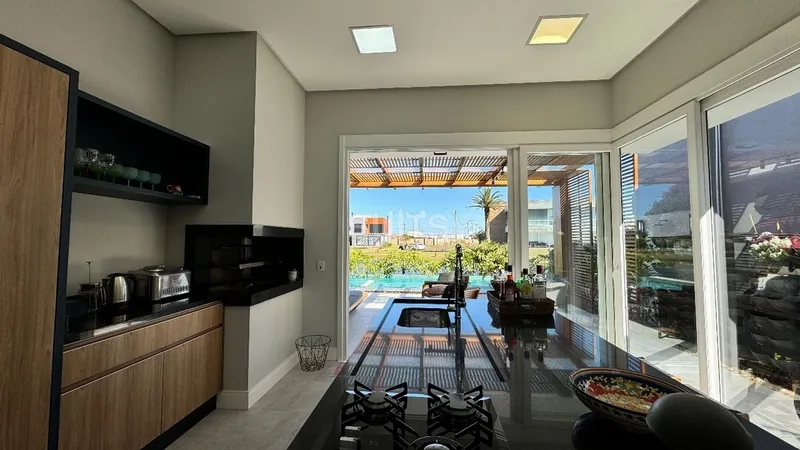 Excelente Casa Beira Lago com Piscina no Condomínio Riviera: 13ª foto da galeria de imagens do imóvel