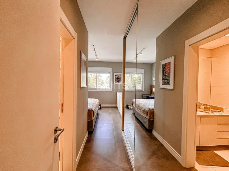 Lindo giardino beira lago no condomínio Rossi em Atlântida: 16ª foto da galeria de imagens do imóvel