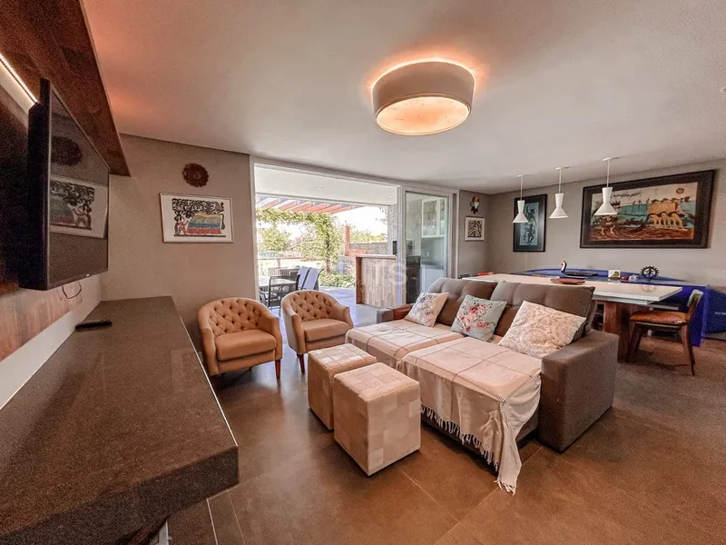 Lindo giardino beira lago no condomínio Rossi em Atlântida: 2ª foto da galeria de imagens do imóvel