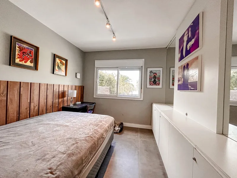 Lindo giardino beira lago no condomínio Rossi em Atlântida: 17ª foto da galeria de imagens do imóvel