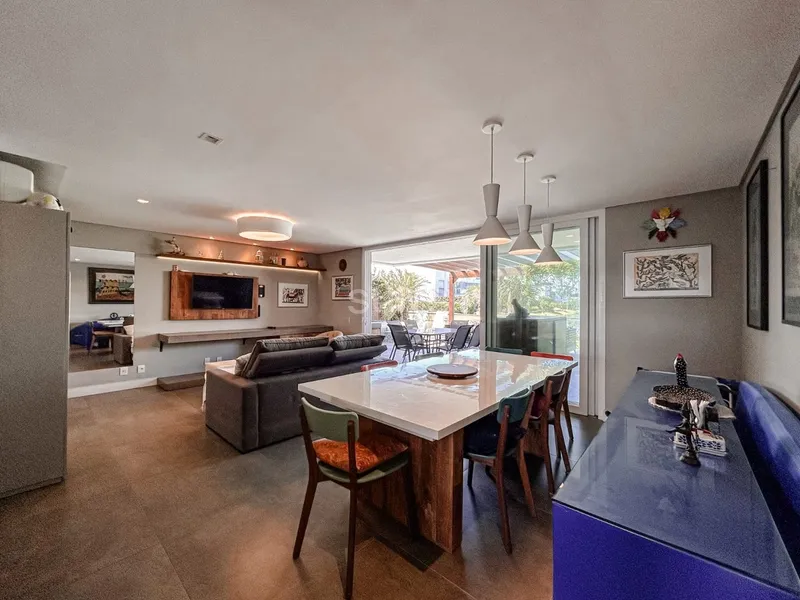 Lindo giardino beira lago no condomínio Rossi em Atlântida: 5ª foto da galeria de imagens do imóvel