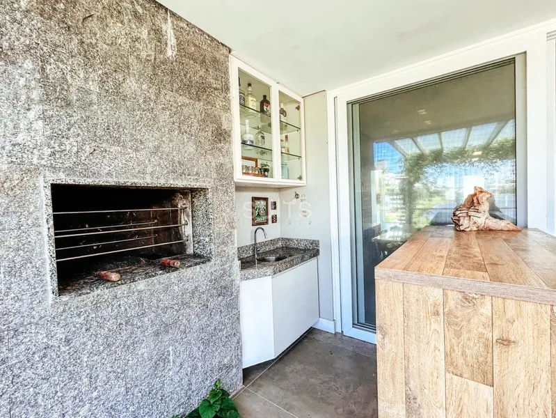 Lindo giardino beira lago no condomínio Rossi em Atlântida: 33ª foto da galeria de imagens do imóvel