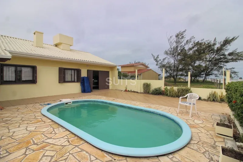 Excelente casa à 30 metros do mar no centro da praia de Xangri-Lá: 4ª foto da galeria de imagens do imóvel