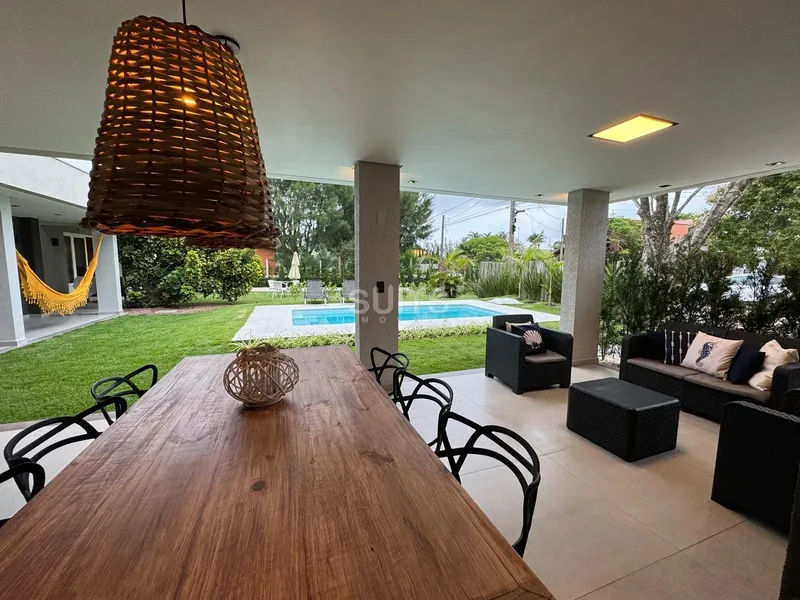 Excelente casa com 02 terrenos próxima do mar no centro de Xangri-Lá: 7ª foto da galeria de imagens do imóvel