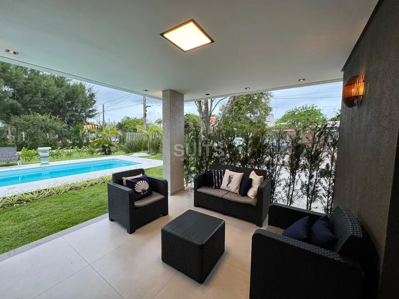 Excelente casa com 02 terrenos próxima do mar no centro de Xangri-Lá: 3ª foto da galeria de imagens do imóvel