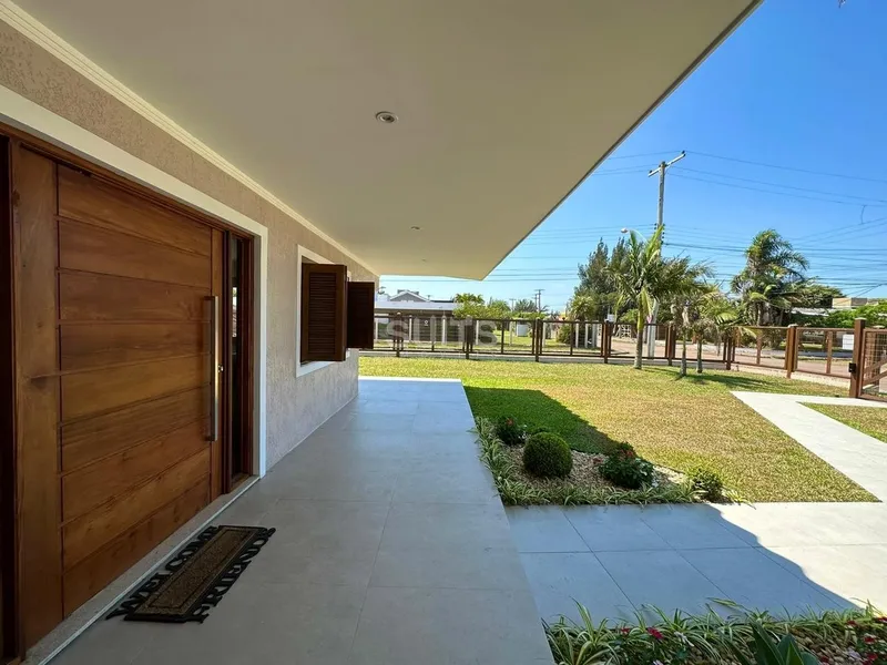 Linda Casa de esquina na praia de Atlântida: 15ª foto da galeria de imagens do imóvel
