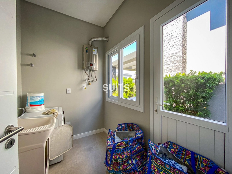 Incrível casa térrea beira lago no condomínio Enseada: 13ª foto da galeria de imagens do imóvel