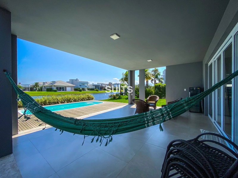 Incrível casa térrea beira lago no condomínio Enseada: 31ª foto da galeria de imagens do imóvel