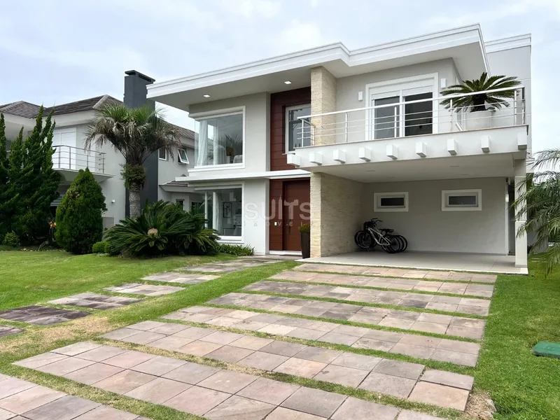 Excelente sobrado à venda no condomínio Ventura em Xangri-lá: 3ª foto da galeria de imagens do imóvel