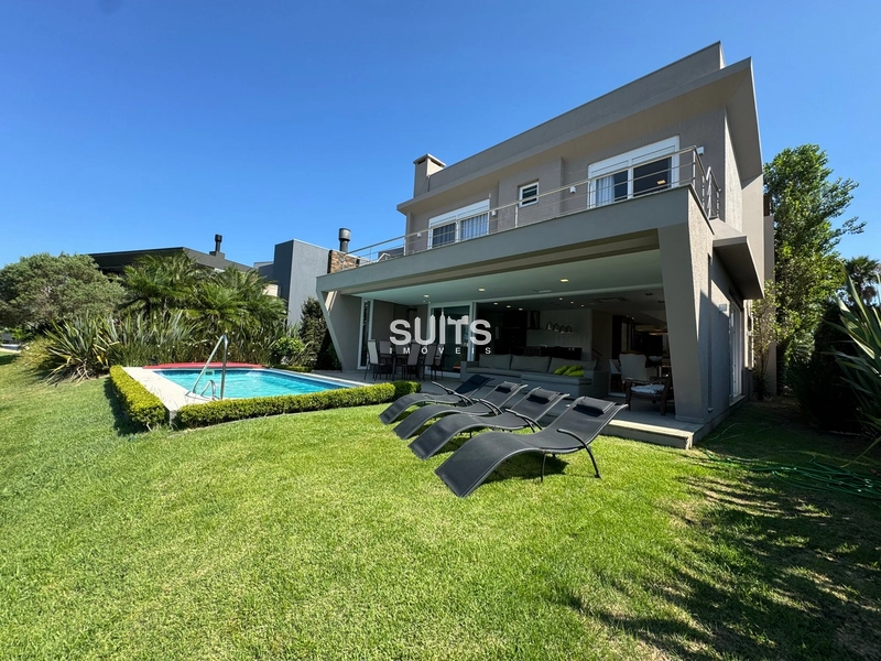 Excelente sobrado no Condomínio Enseada em Xangri-Lá: 55ª foto da galeria de imagens do imóvel