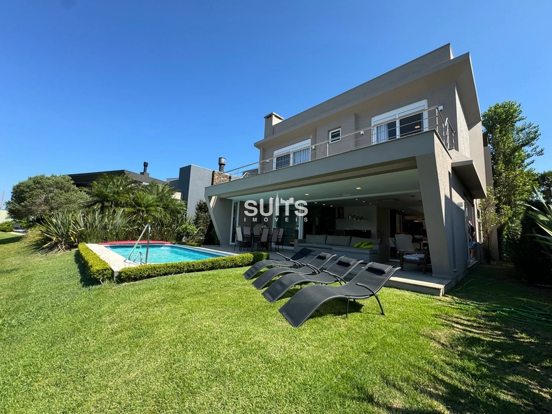 Excelente sobrado no Condomínio Enseada em Xangri-Lá: 54ª foto da galeria de imagens do imóvel