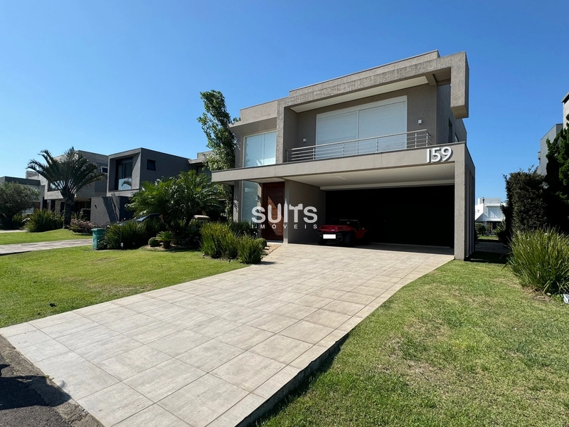 Excelente sobrado no Condomínio Enseada em Xangri-Lá: 2ª foto da galeria de imagens do imóvel