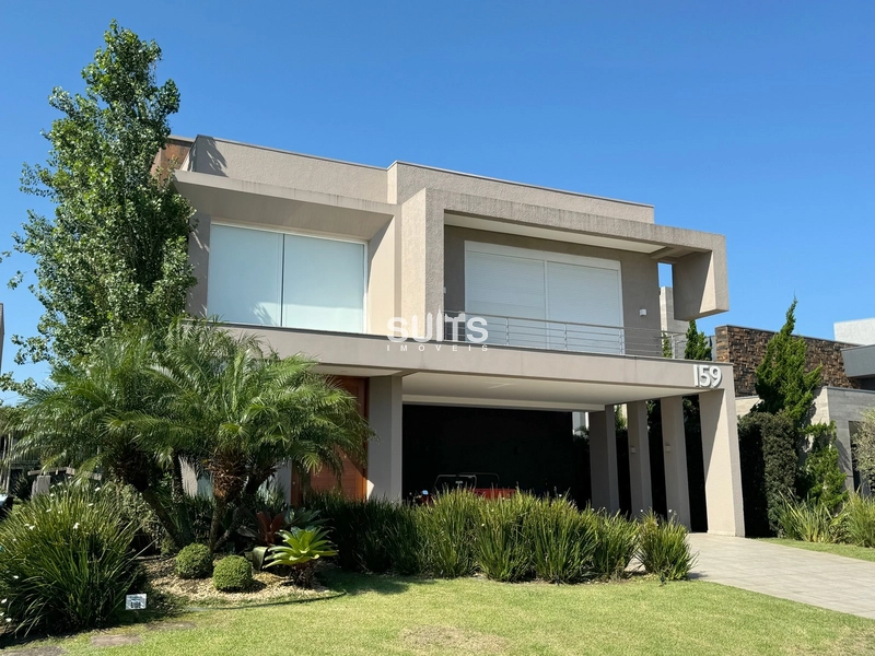 Excelente sobrado no Condomínio Enseada em Xangri-Lá: 1ª foto da galeria de imagens do imóvel