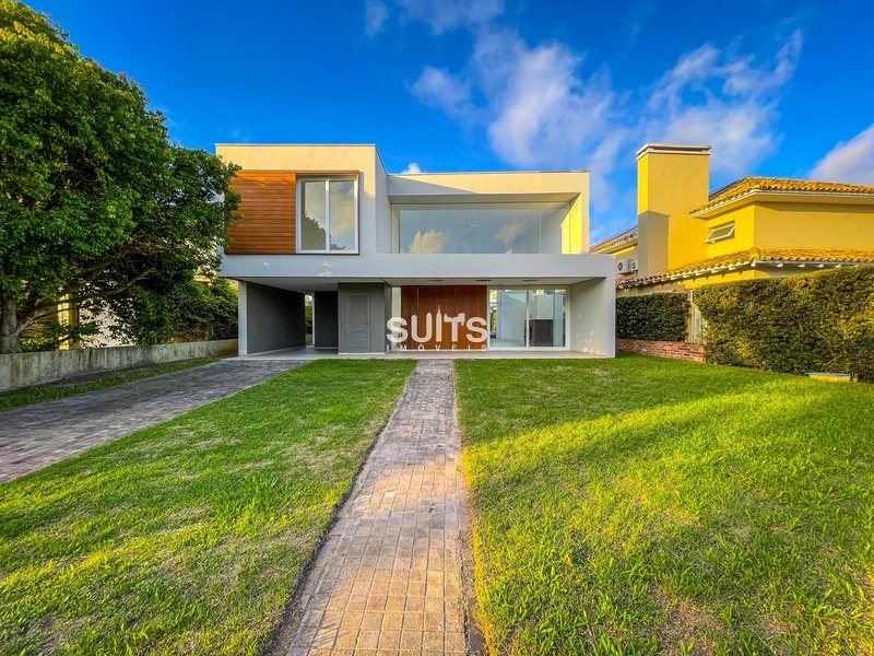 Excelente sobrado no Condomínio Porto Coronado em Atlântida: 1ª foto da galeria de imagens do imóvel