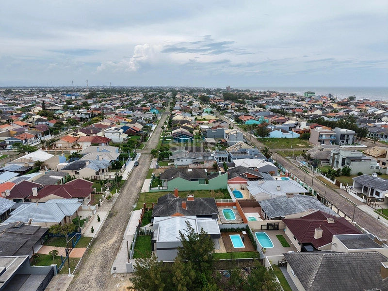 Ótima casa á poucos metros do mar na praia de Atlântida Sul : 8ª foto da galeria de imagens do imóvel