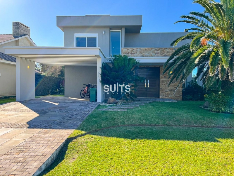 Excelente casa beira lago à venda no condomínio Ventura em Xangri-lá: 2ª foto da galeria de imagens do imóvel