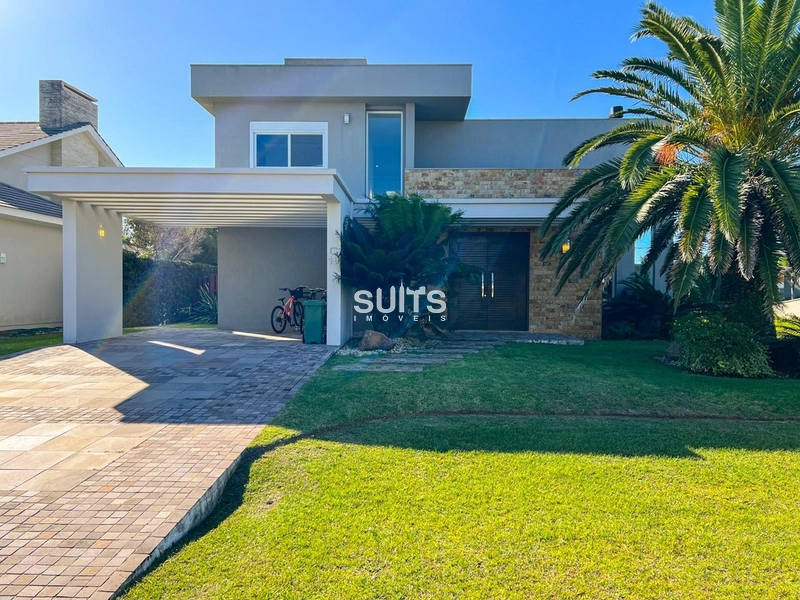 Excelente casa beira lago à venda no condomínio Ventura em Xangri-lá: 1ª foto da galeria de imagens do imóvel